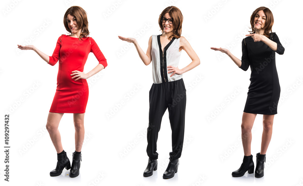 Fototapeta premium Brunette woman holding something