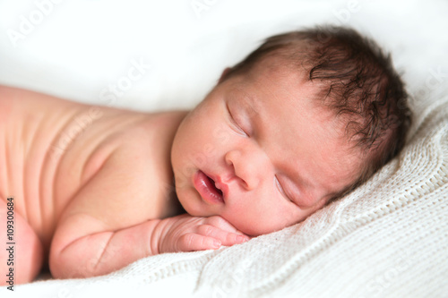 Little newborn baby 14 days, sleeps
