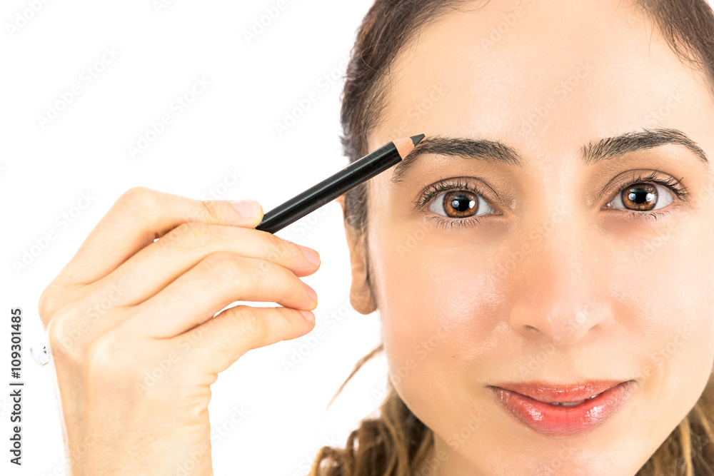 Attractive woman doing make up