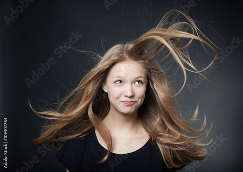beautiful girl portrait with windy hair