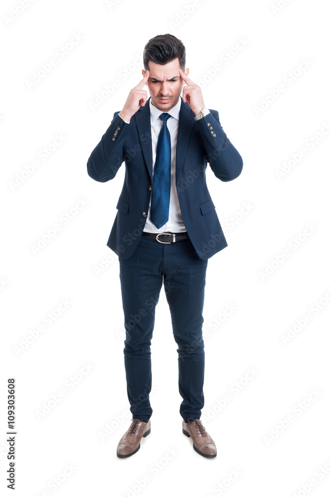 Stressed salesman or broker pressing head on migraine Stressed salesman or broker pressing head on migraine