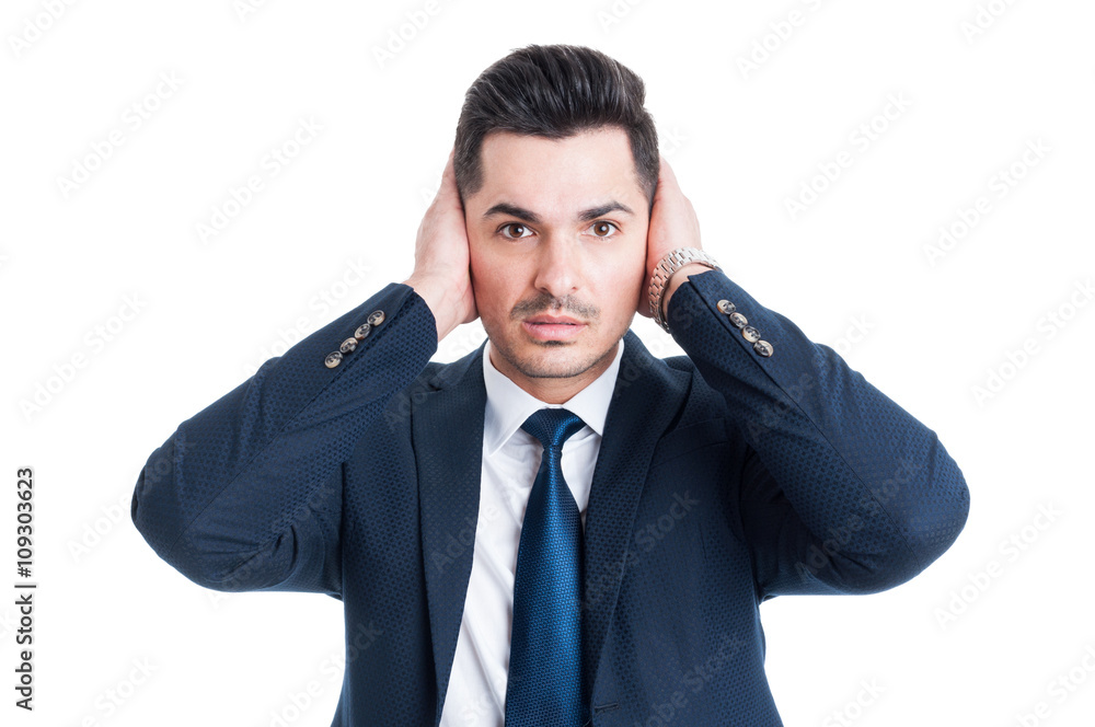 Lawyer or broker covering his ears with palms Lawyer or broker covering his ears with palms