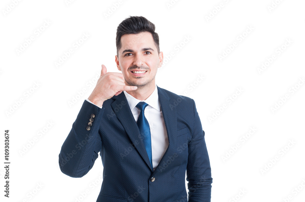 Businessman or salesman making the call me gesture Businessman or salesman making the call me gesture