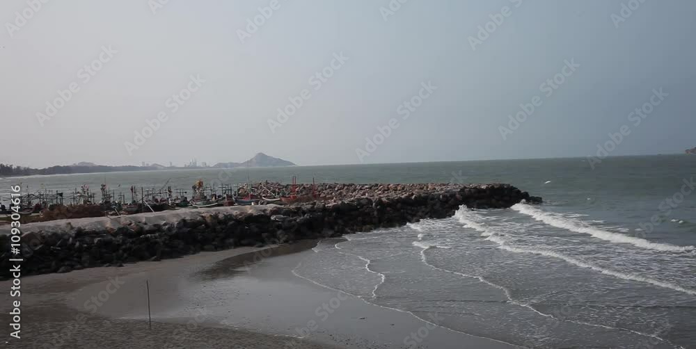 Sea wave breaking on the rock at Thailand beach Sea wave breaking on the rock at Thailand beach