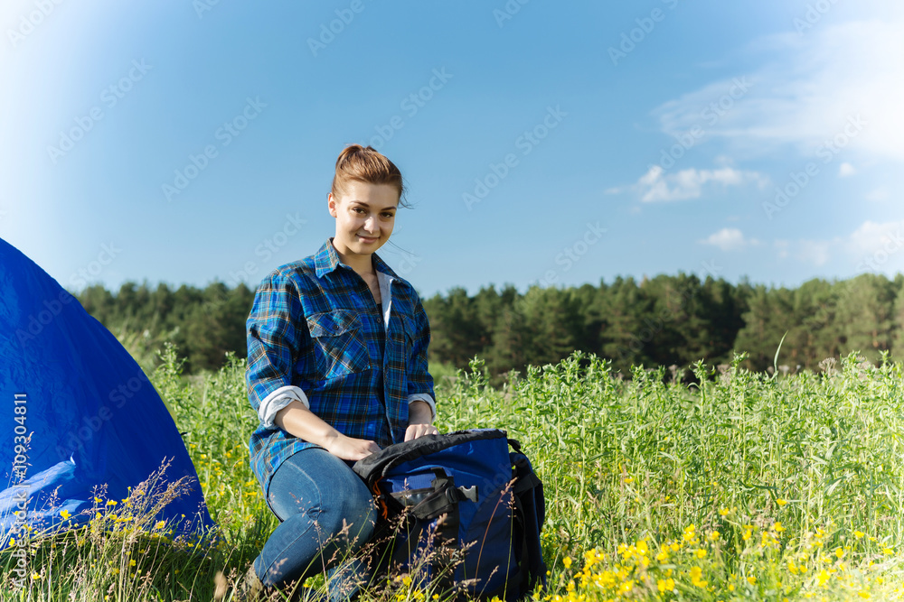 Hiker woman in summer forest Hiker woman in summer forest