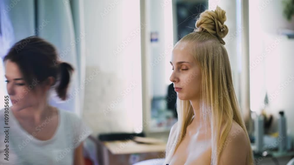 portrait of an attractive, fresh blondes. It is the top model, she made a spectacular makeup for a photo shoot, or the podium. portrait of an attractive, fresh blondes. It is the top model, she made a spectacular makeup for a photo shoot, or the podium.