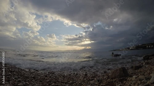 Dramatic stormy sky across the restless sea. Camp Ostro, Croatia. photo