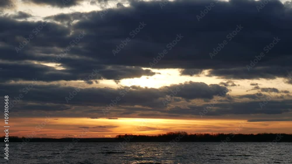 Orange Sunset With Clouds on the River Orange Sunset With Clouds on the River