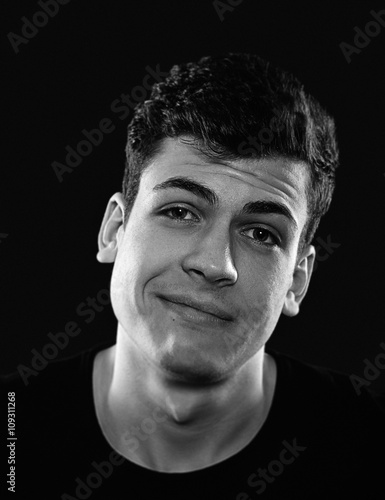 Canvas-taulu sarcastic young man studio portrait