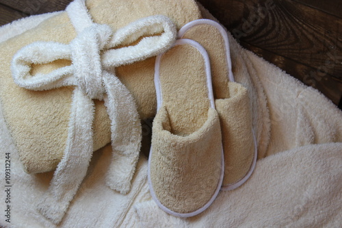 Slippers and a towel.