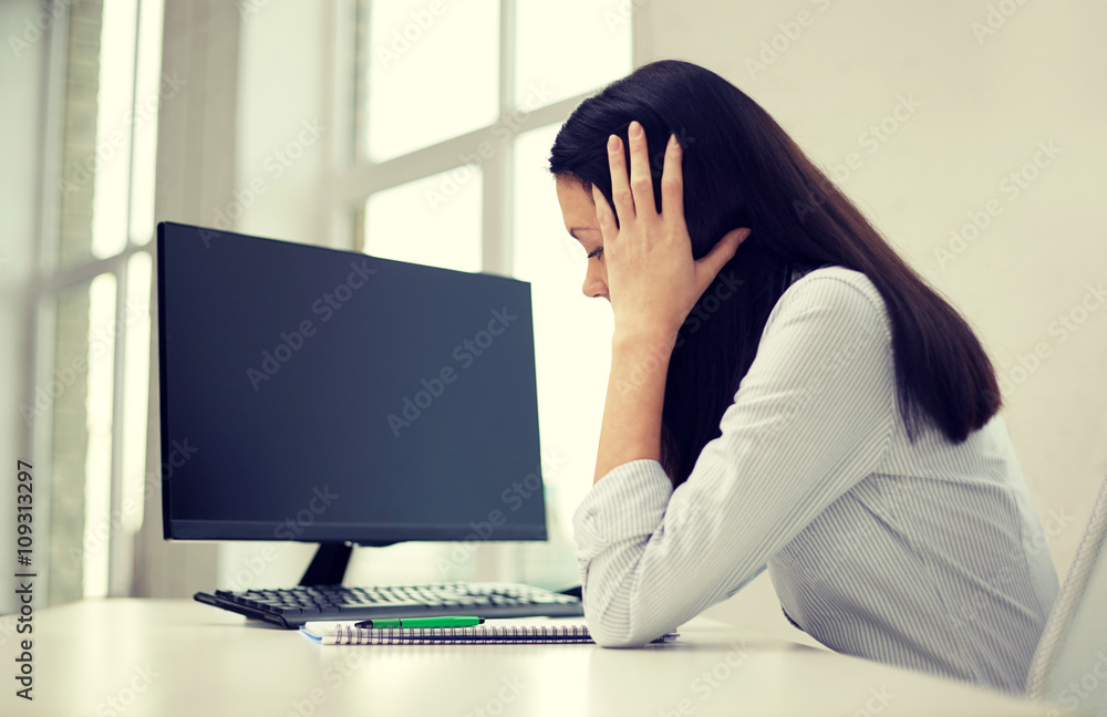 close up of sad woman with computer and notebook close up of sad woman with computer and notebook