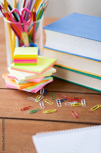close up of pens, books, clips and stickers