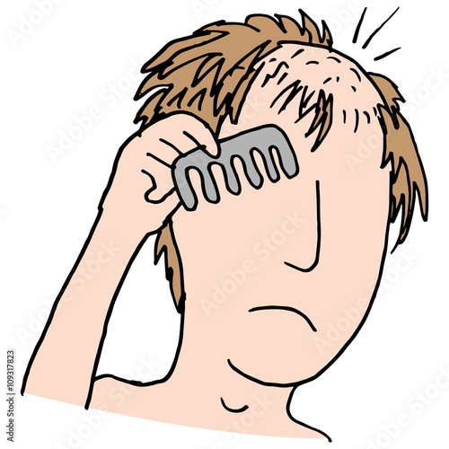 Balding man combing hair