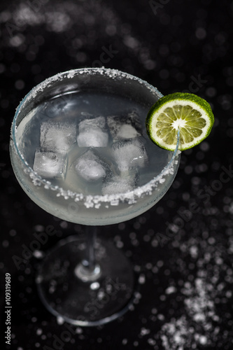 Margarita cocktail on black background