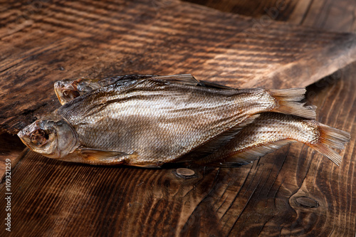 dried fish on a wooden background