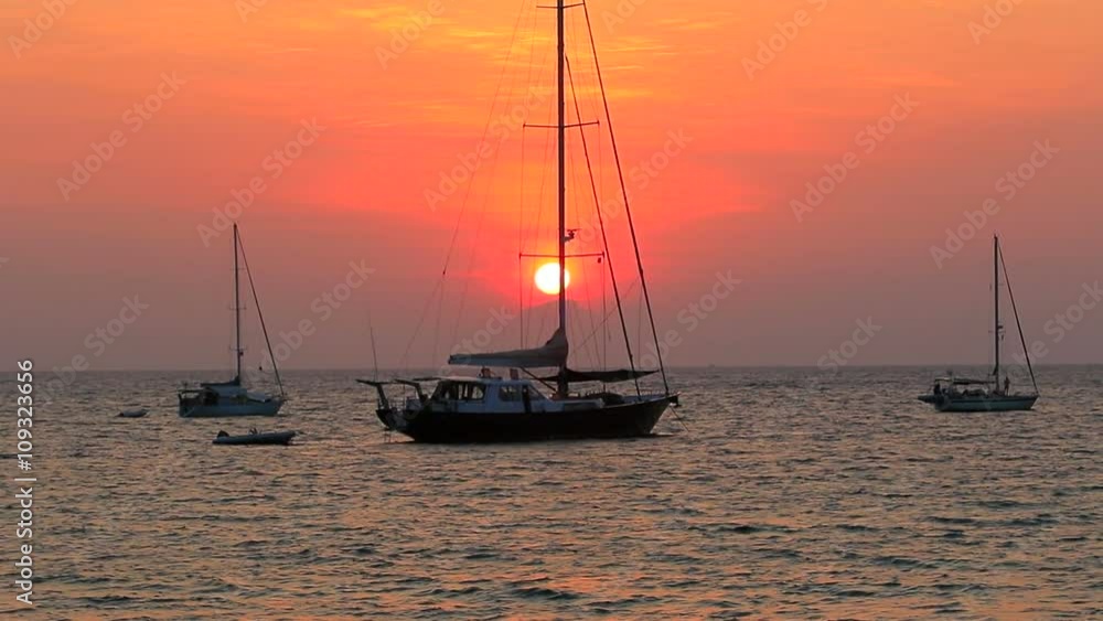 sun set and silhouette of sailing boat sun set and silhouette of sailing boat