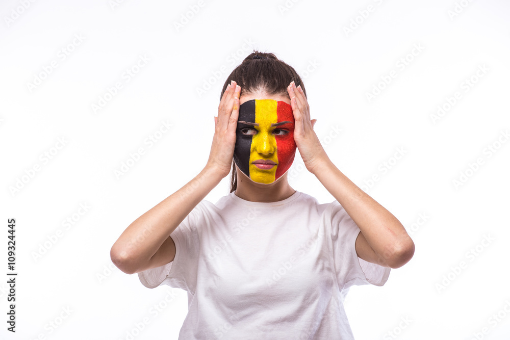 Unhappy and Failure of goal or lose game emotions of Belgian football fan in game supporting of Belgium national team on white background. European football fans concept. Unhappy and Failure of goal or lose game emotions of Belgian football fan in game supporting of Belgium national team on white background. European football fans concept.