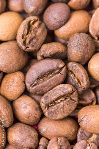 Extreme macro coffee beans background © zlajaphoto