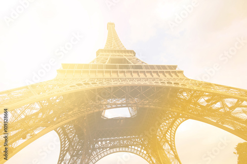 Eiffel Tower Landmark of Paris with warm lighting effect for travel background © aaa187