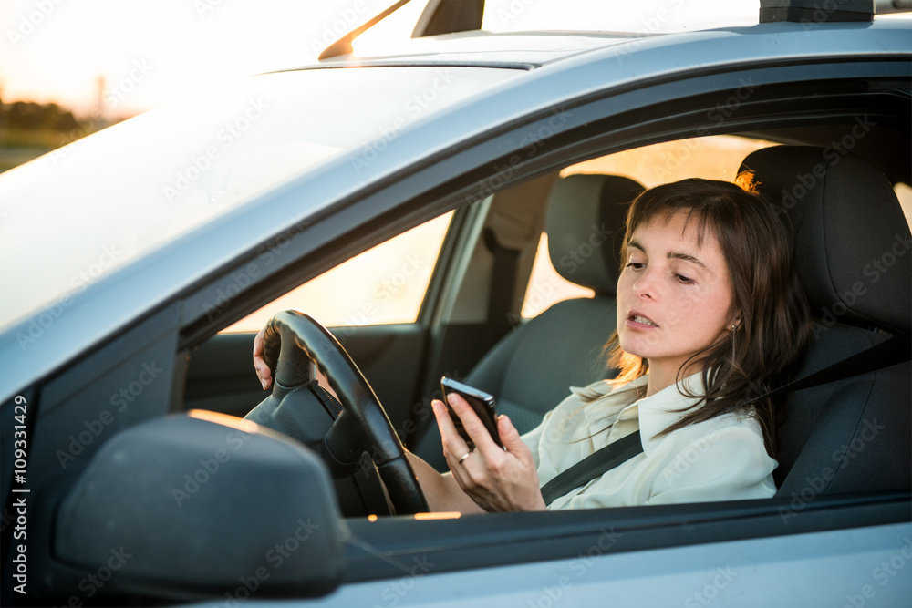 Driving car and looking in phone