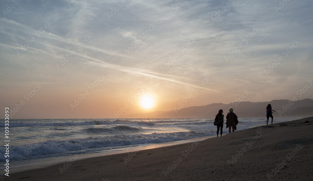 The Pacific ocean during sunset. Landscape with blue sea, the mountains and the dusk sky, the USA, Santa Monica. The Pacific ocean during sunset. Landscape with blue sea, the mountains and the dusk sky, the USA, Santa Monica.