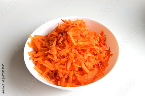 Plate with grated carrots.