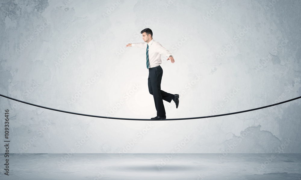 © ra2 studio - Sales guy balancing on tight rope © ra2 studio - Sales guy balancing on tight rope