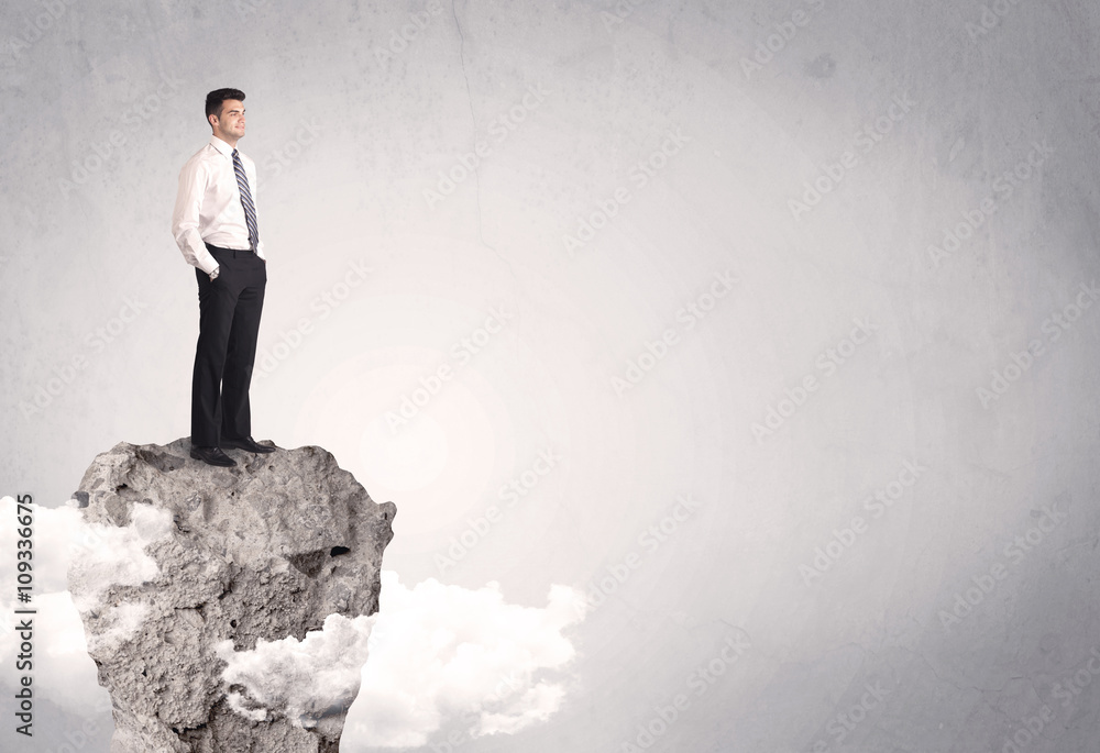 Best salesman on cliff in clear space Best salesman on cliff in clear space