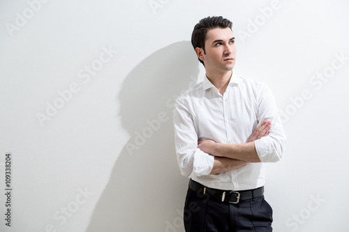 Caucasian male with crossed arms © ImageFlow