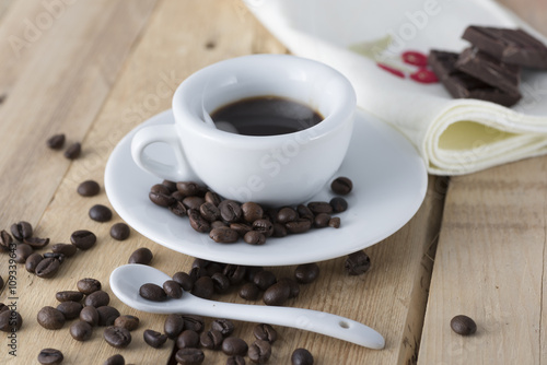 Wallpaper Mural hot espresso coffee in a white cup served on an old wooden table. Torontodigital.ca