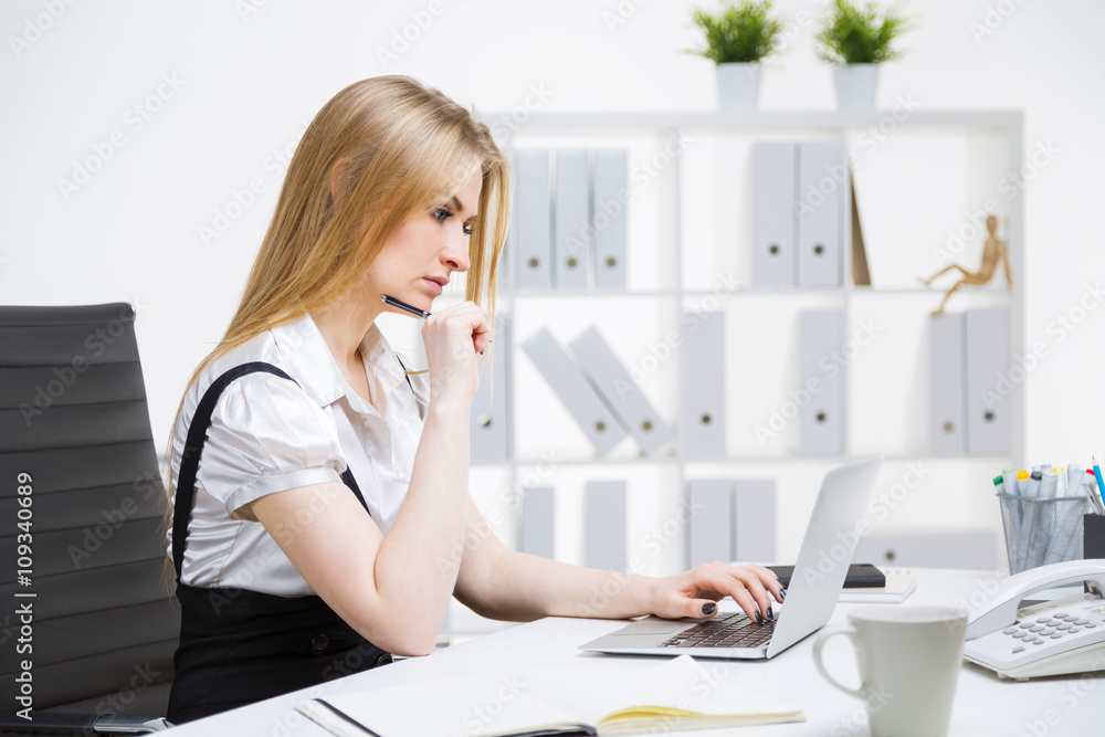 Businesswoman using laptop