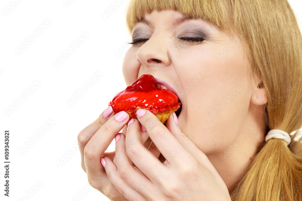 Woman eating cupcake sweet food Woman eating cupcake sweet food