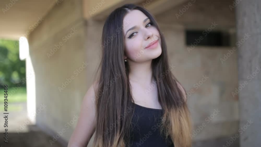 a large portrait of a young sexy girl with big eyes and long hair a large portrait of a young sexy girl with big eyes and long hair