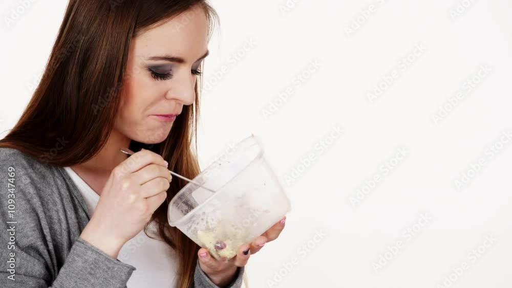 Woman eat oatmeal with dry fruits. Dieting 4K. Woman eat oatmeal with dry fruits. Dieting 4K.