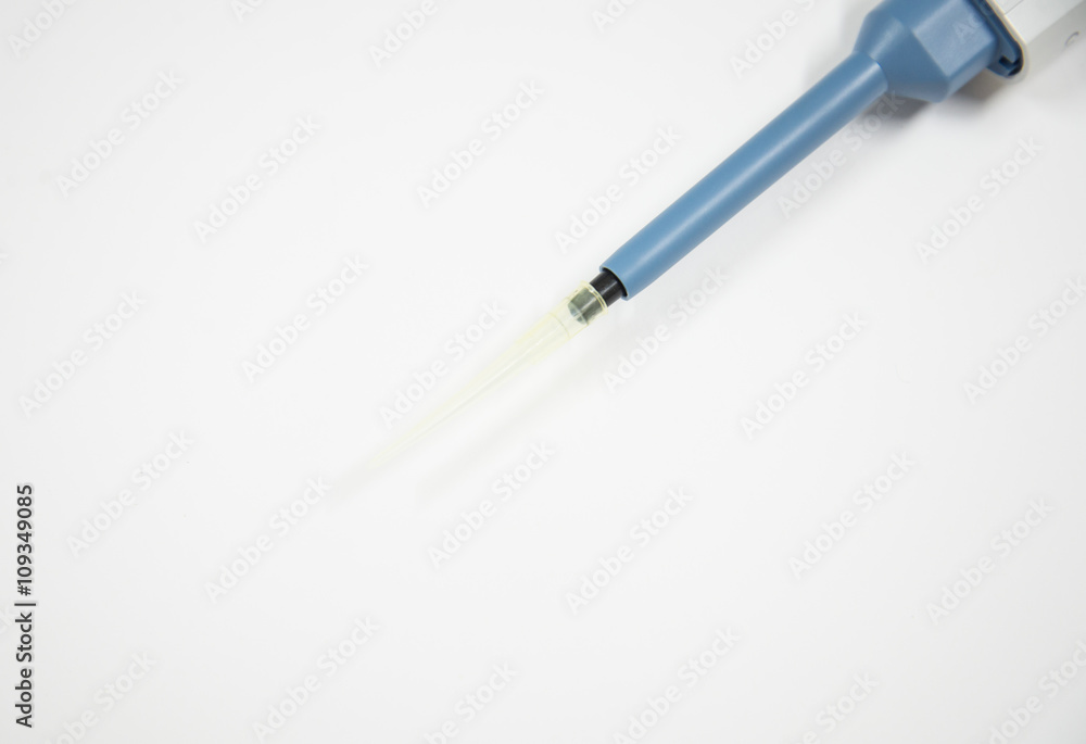 Close up auto pipette on white background. Close up auto pipette on white background.