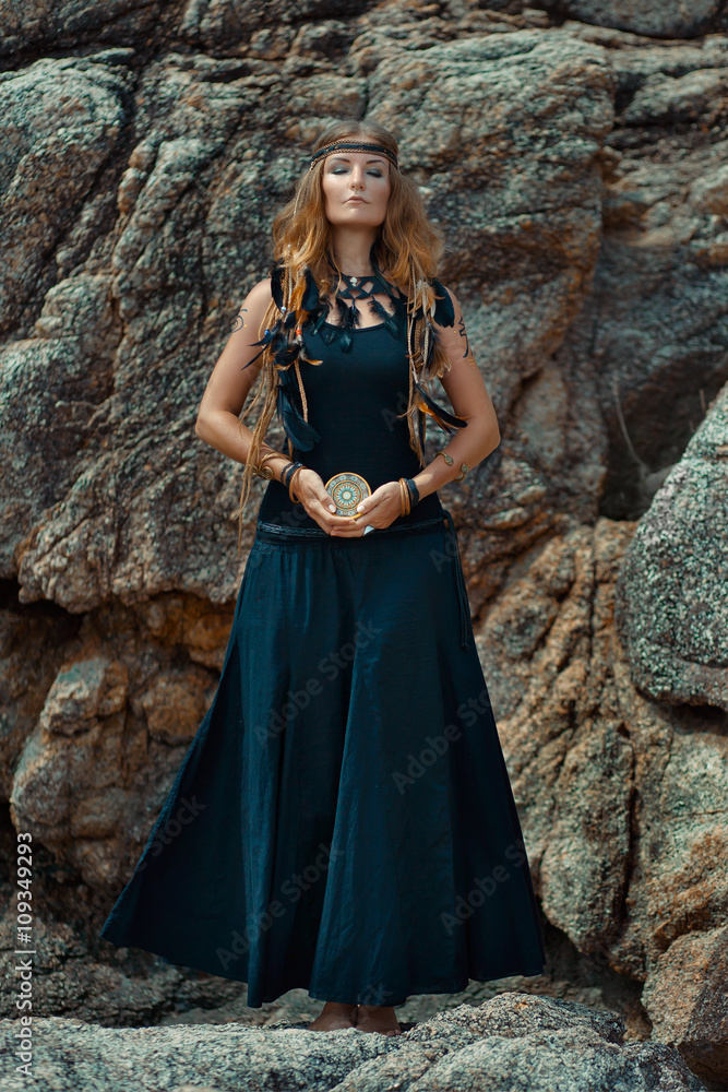 young beautiful woman with tarot cards in her hands with stone b young beautiful woman with tarot cards in her hands with stone b