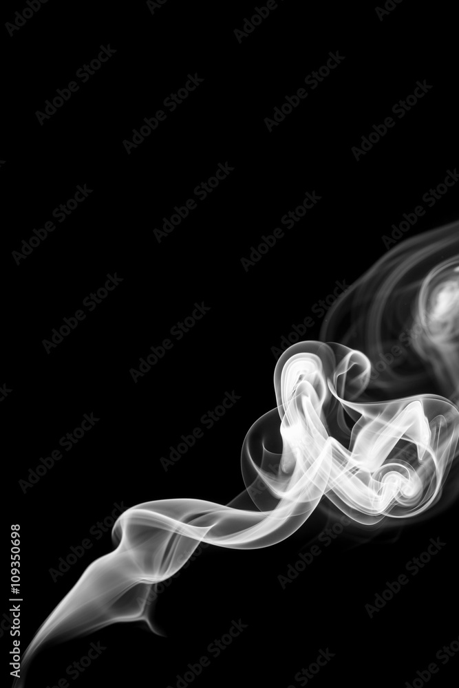 Fototapeta premium Abstract gray smoke from the incense sticks.