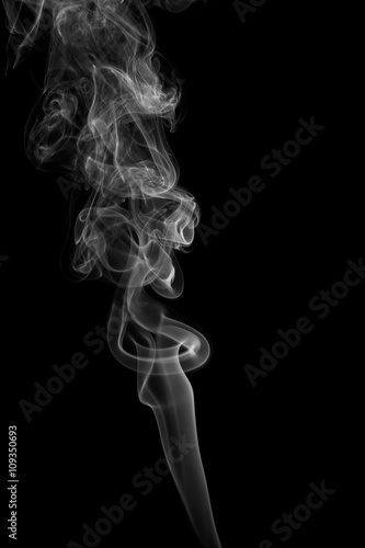 Fototapeta Naklejka Na Ścianę i Meble -  Abstract gray smoke from the incense sticks.