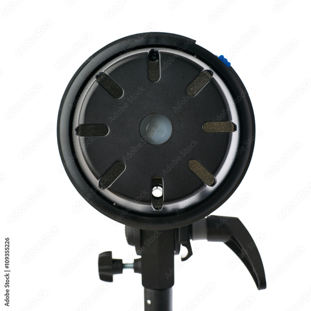 Studio flash on a stand over isolated white background Studio flash on a stand over isolated white background