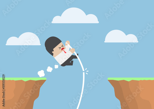 Businessman pole vault across the cliff but he fail