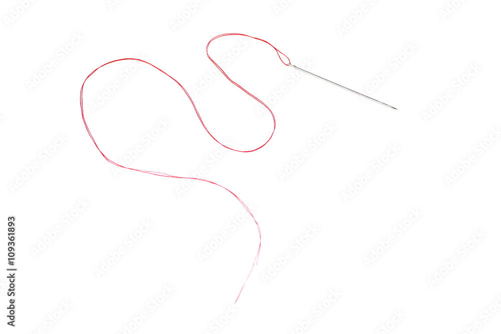 Small needle with thread isolated over the white background Small needle with thread isolated over the white background