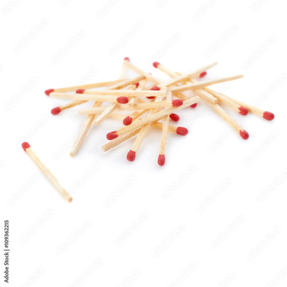 Pile of Wooden matches isolated over the white background Pile of Wooden matches isolated over the white background