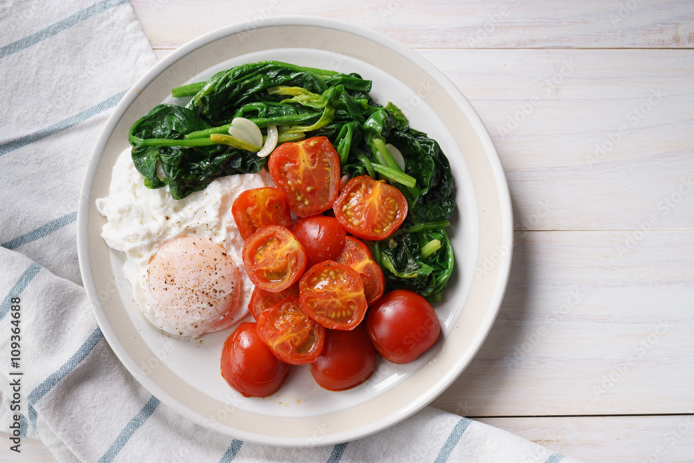 tomato and spinach salad with egg. tomato and spinach salad with egg.