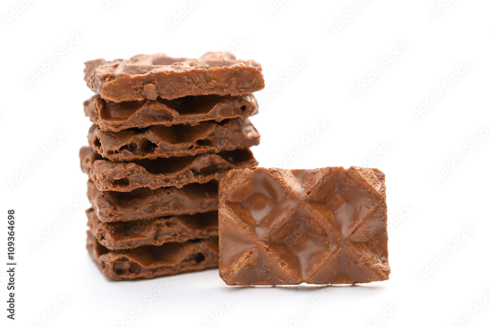 chocolate blocks stack up on a white background chocolate blocks stack up on a white background