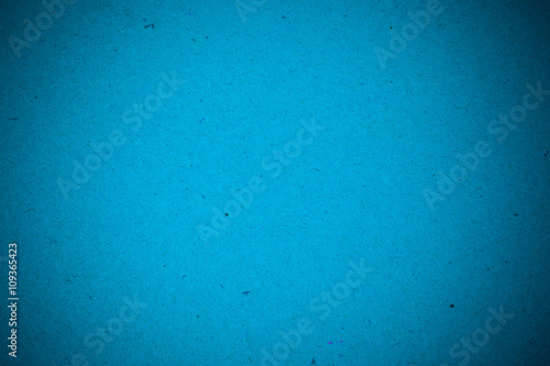 Blue recycled paper background.