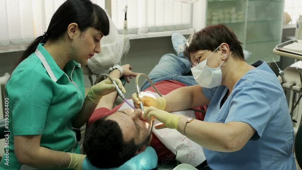 Treatment of caries. Man visits the dentist. Treatment of caries. Man visits the dentist.