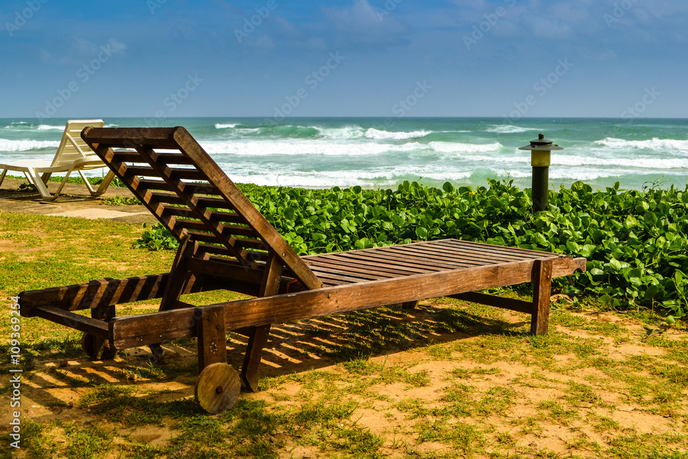 Recliner on the beach in Sri Lanka near Indian Ocean Recliner on the beach in Sri Lanka near Indian Ocean