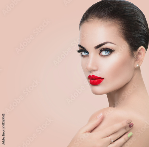 Beauty fashion model woman. Girl with red sexy lips and blue eyes