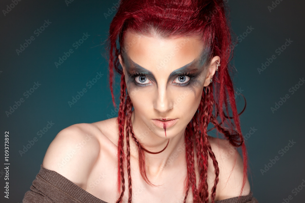 Fototapeta premium Creative portrait of a girl with a contrasting color