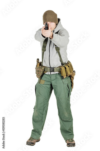 rebel or private military contractor holding black gun. war, arm